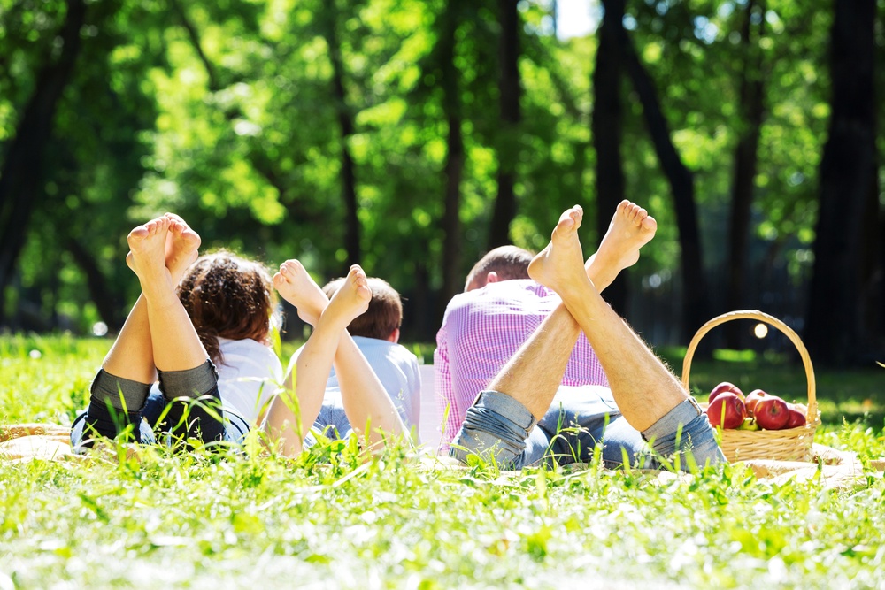 Happy family having weekend in summer park.jpeg